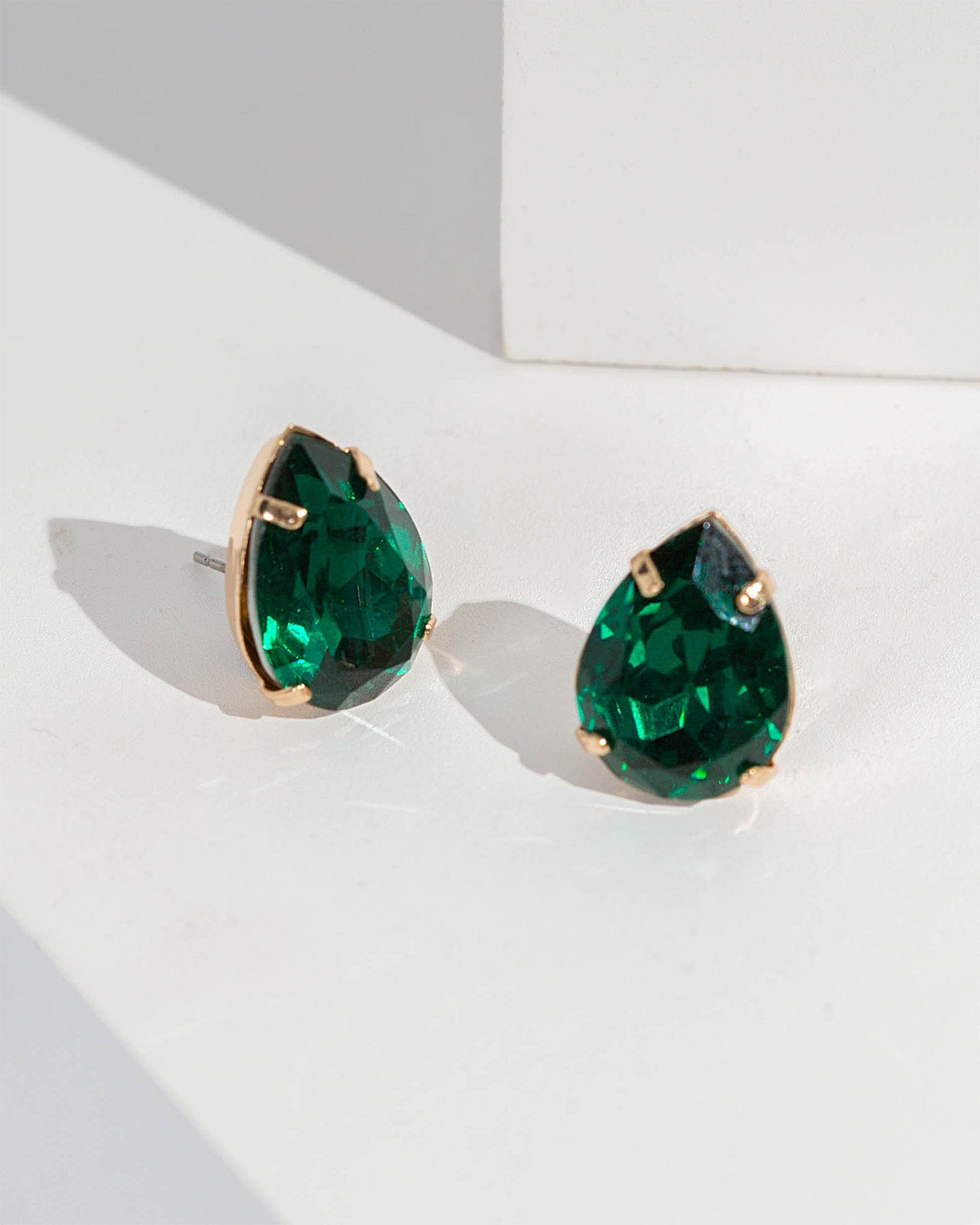 Green diamond sales stud earrings