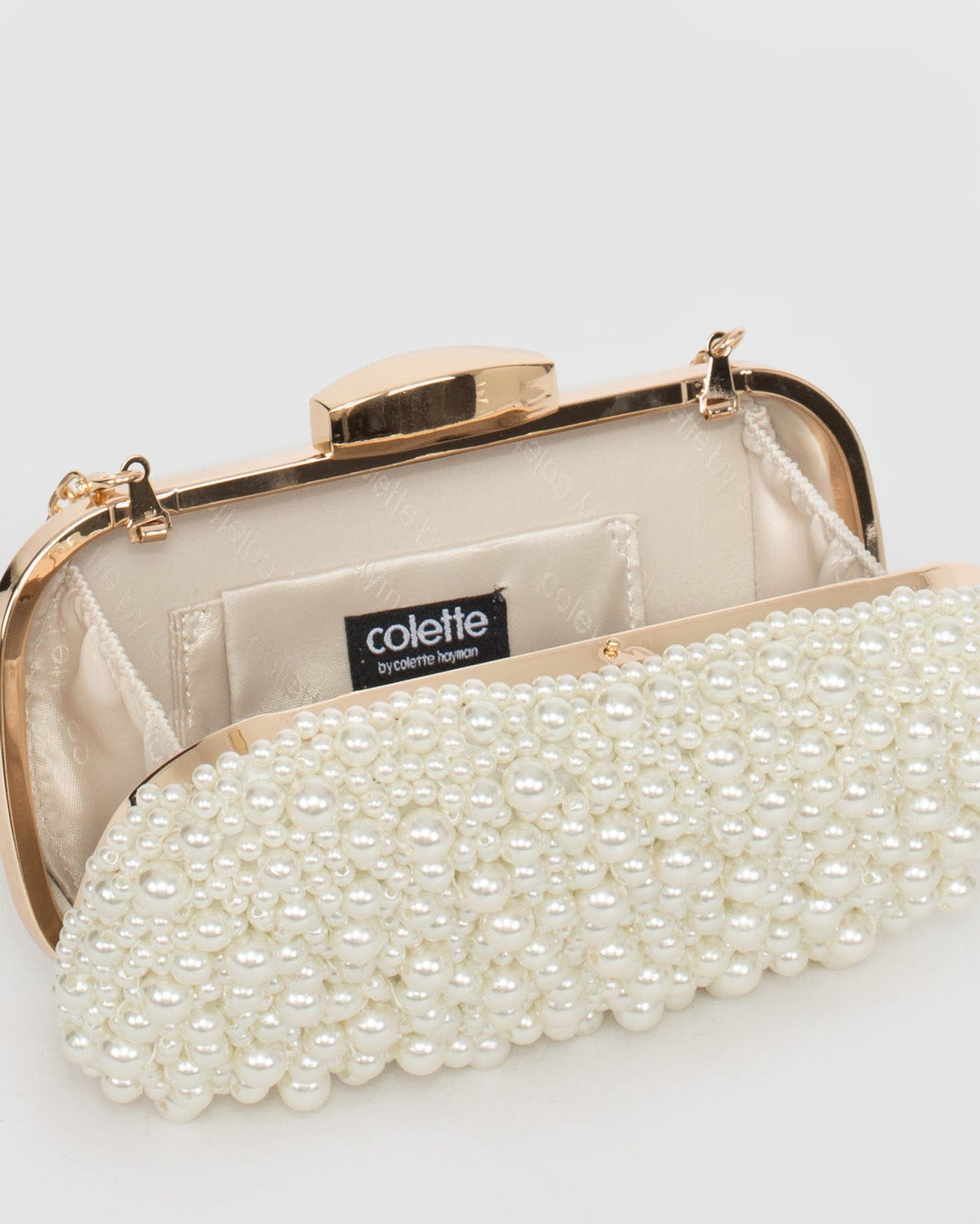 Ivory beaded hot sale clutch bag