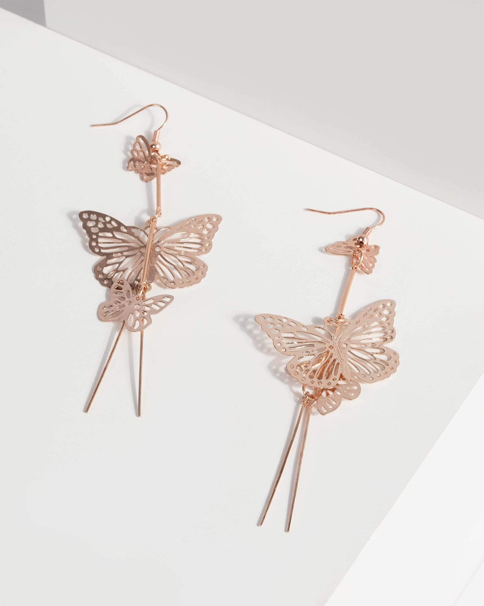 Rose gold butterfly on sale earrings